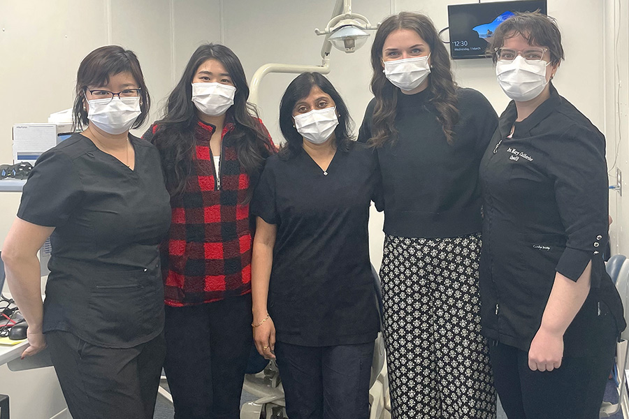 College of Dentistry students Joanna Tran (second from left) and Brooklyn Park (second from right) observed the oral health team that is part of the Canadian Health Measures Survey,