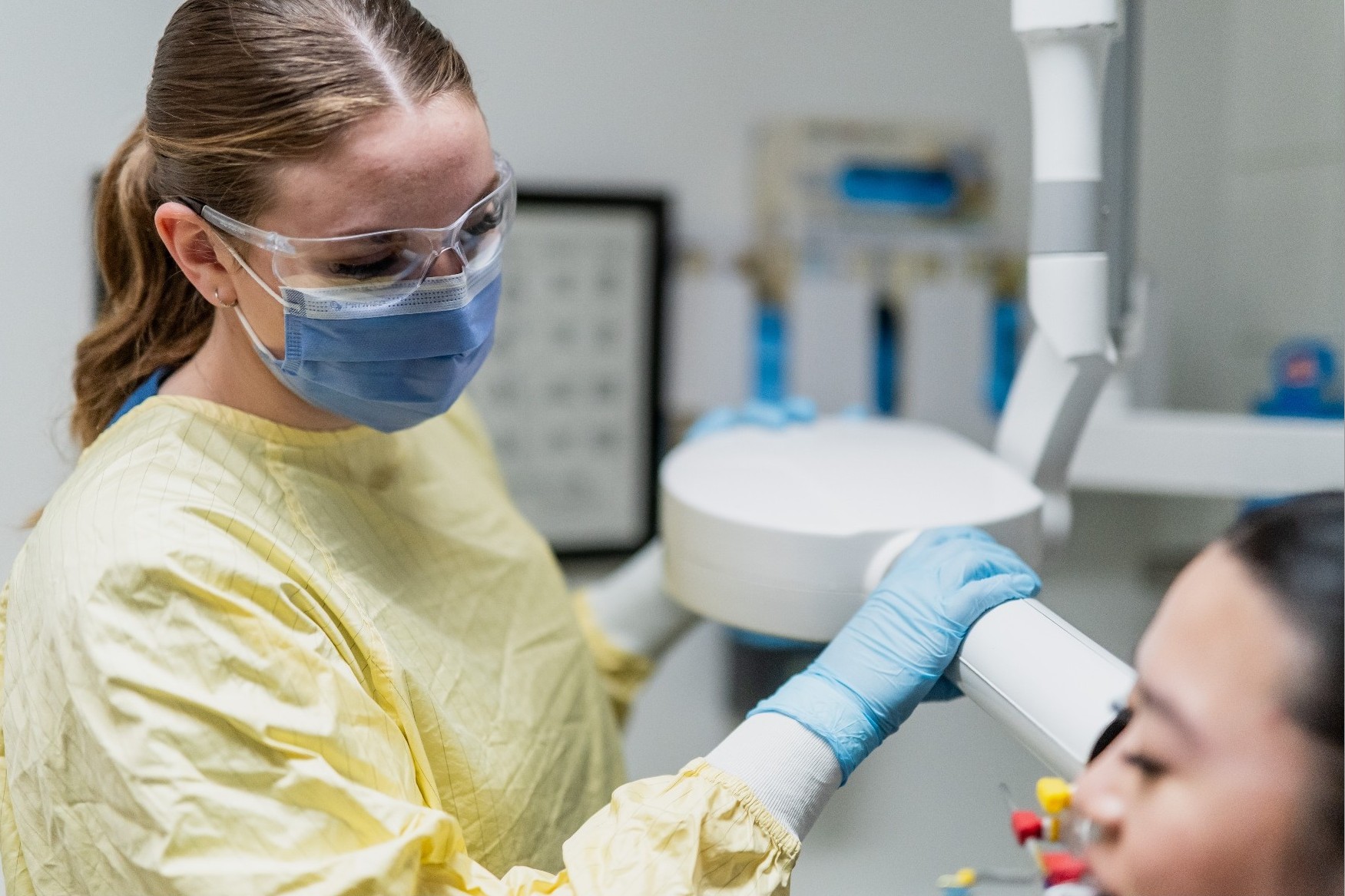 University of Saskatchewan College of Dentistry student providing patient care.